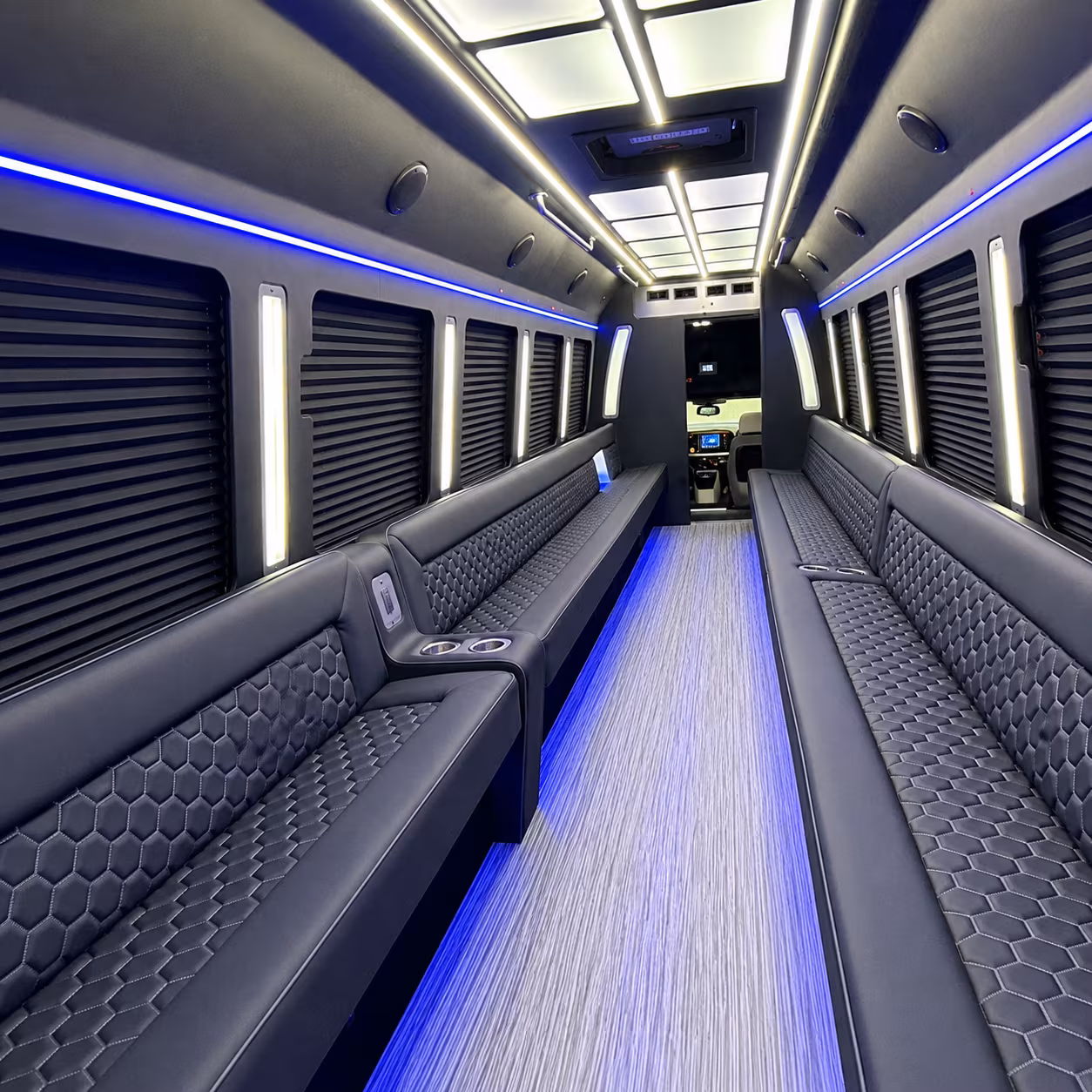 Wedding guests seated inside a Ann Arbor party bus